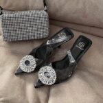 Tacón vinilo broche negro